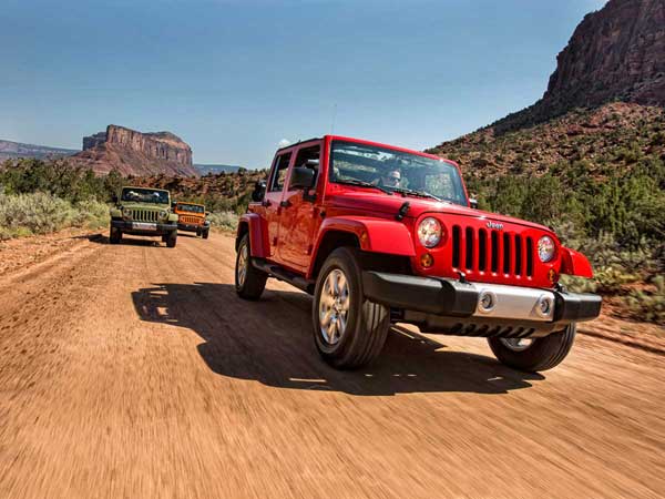 Jeep Racing Down Road near Gateway Canyons Resort