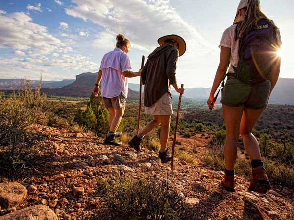 Girls Hiking Downhill