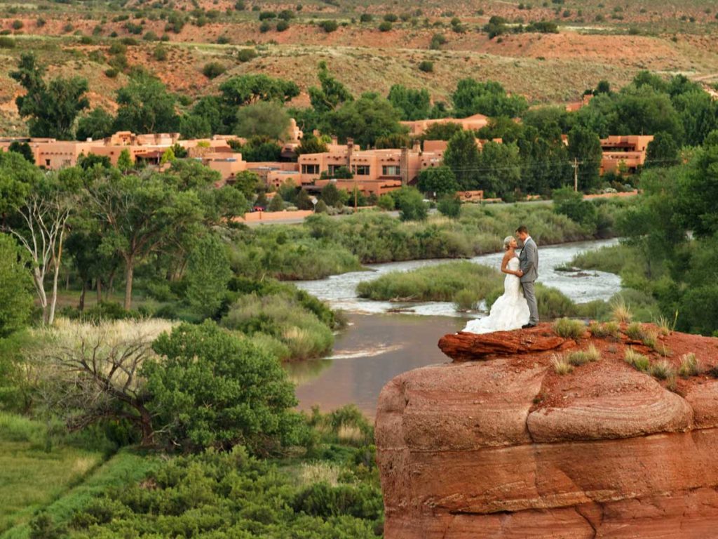 Bride and groom on rocks at Gateway Canyons Resort Wedding
