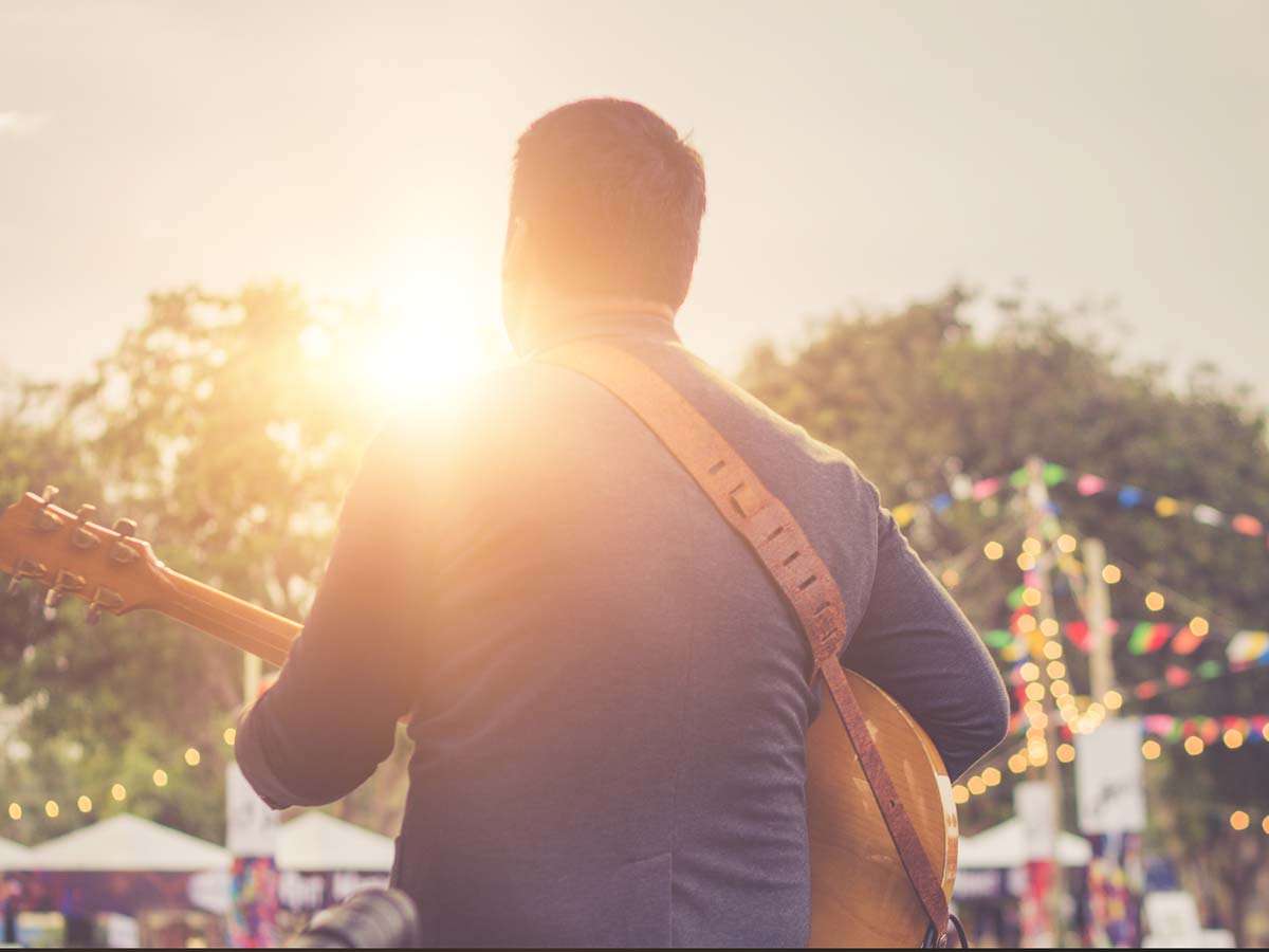 Guitar Player Doing A Concert.