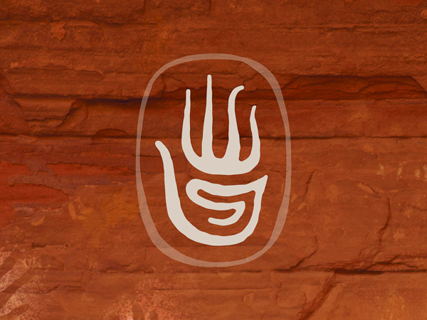 Red Rock With The Tierra Rojas Spa Logo